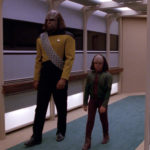 Worf walks Alexander down the hall in "New Ground"