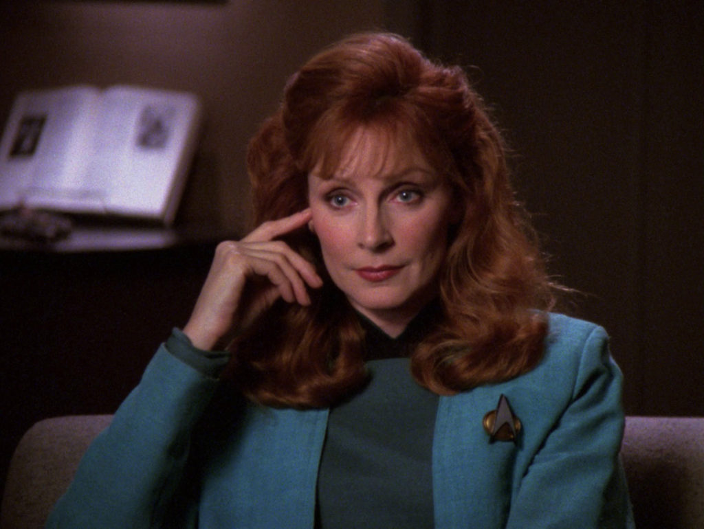 Crusher listening to Picard in "The Perfect Mate"