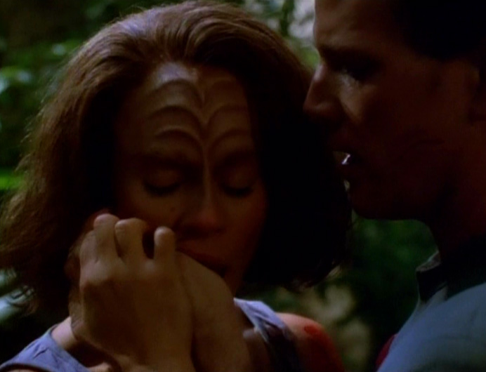 Tom and B'Elanna embrace in "Blood Fever"