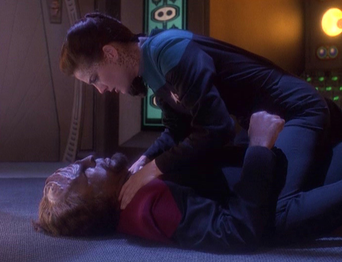 Dax on top of Worf after fighting in "Looking for Par'Mach in All the Wrong Places"