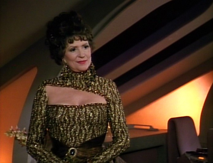 Lwaxana Troi in gold dress