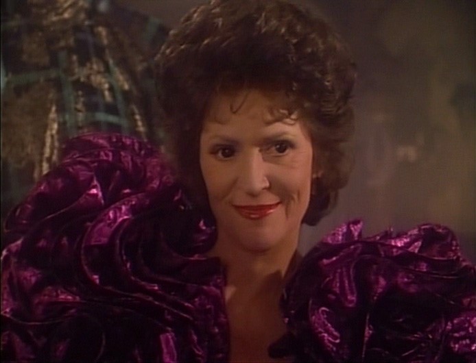 Lwaxana Troi in flouncy purple dress