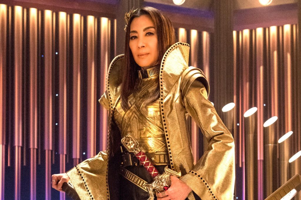 Mirror Georgiou posing in her gold Terran Emperor regalia