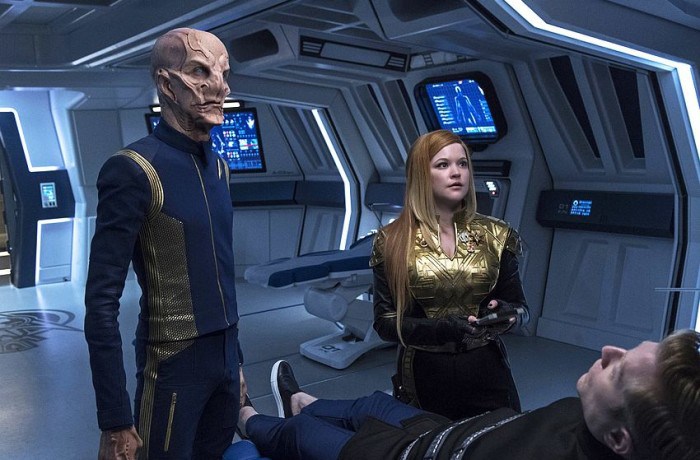 Tilly and Saru look at Stamets in Sickbay