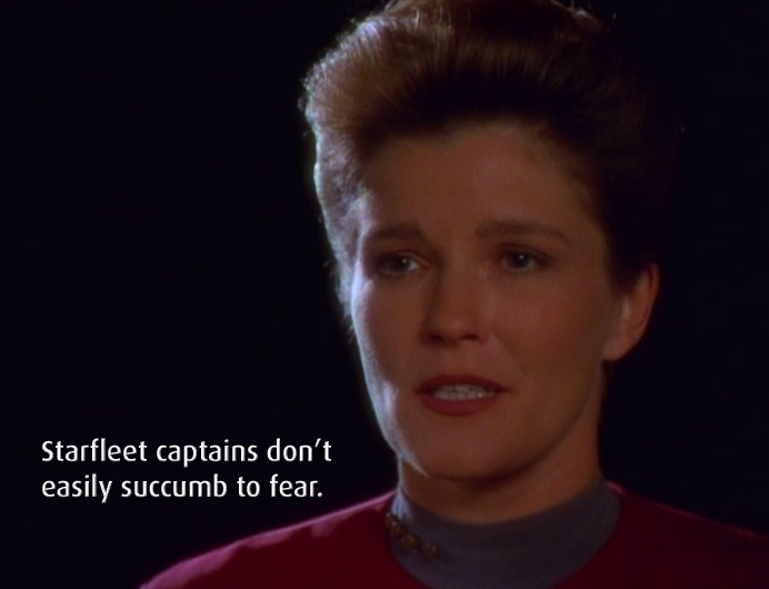 Janeway with quote: "Starfleet Captains don't easily succumb to fear"
