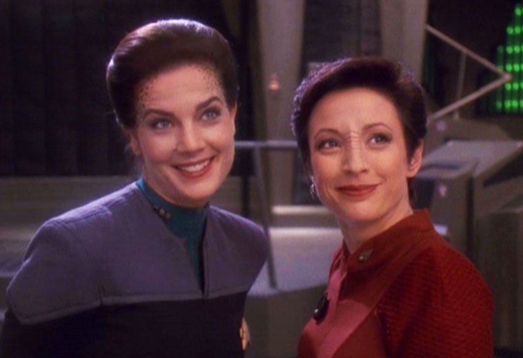 Jadzia Dax and Kira on the Promenade, smiling