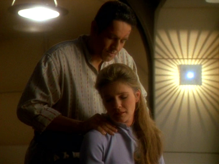 Chakotay rubs Janeway's neck in Resolutions