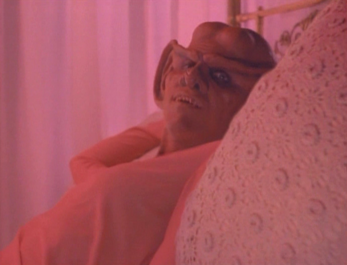 Quark's head on a woman's body in "Meridian"