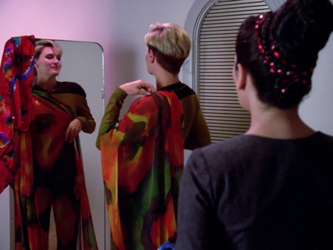 Tasha tries on Deanna's clothes in The Naked Now (Season 1, episode 2, TNG)