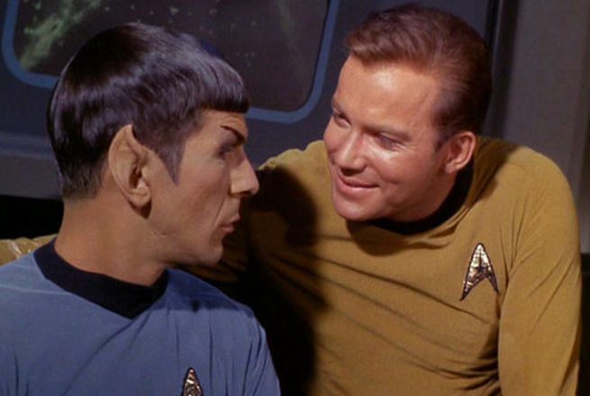 Spock and Kirk chatting, Kirk's arm around Spock