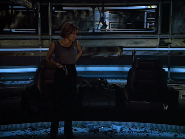 Janeway on the bridge with her pocketwatch in "Year of Hell"