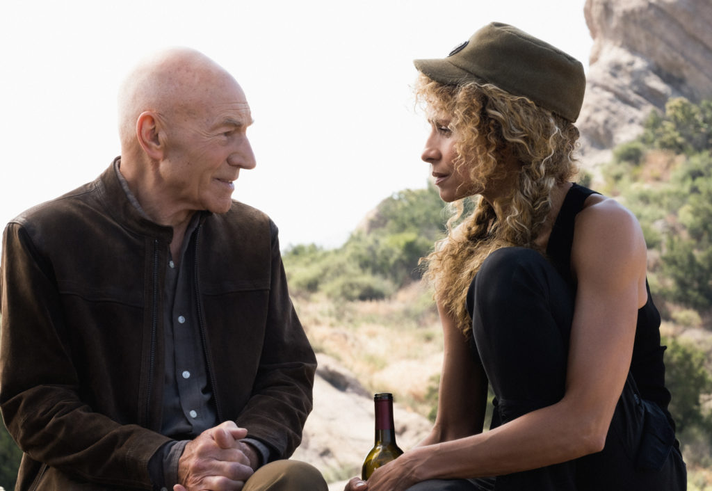 Picard sits with Raffi while she drinks on her patio