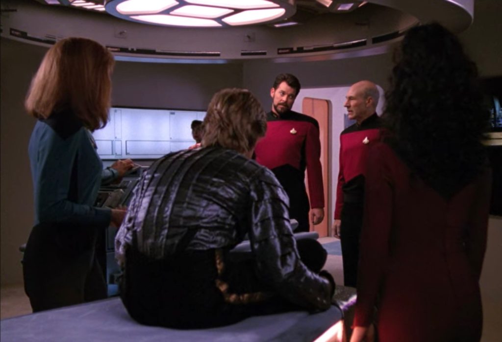 Jono in Sickbay with Crusher, Riker, Picard and Troi