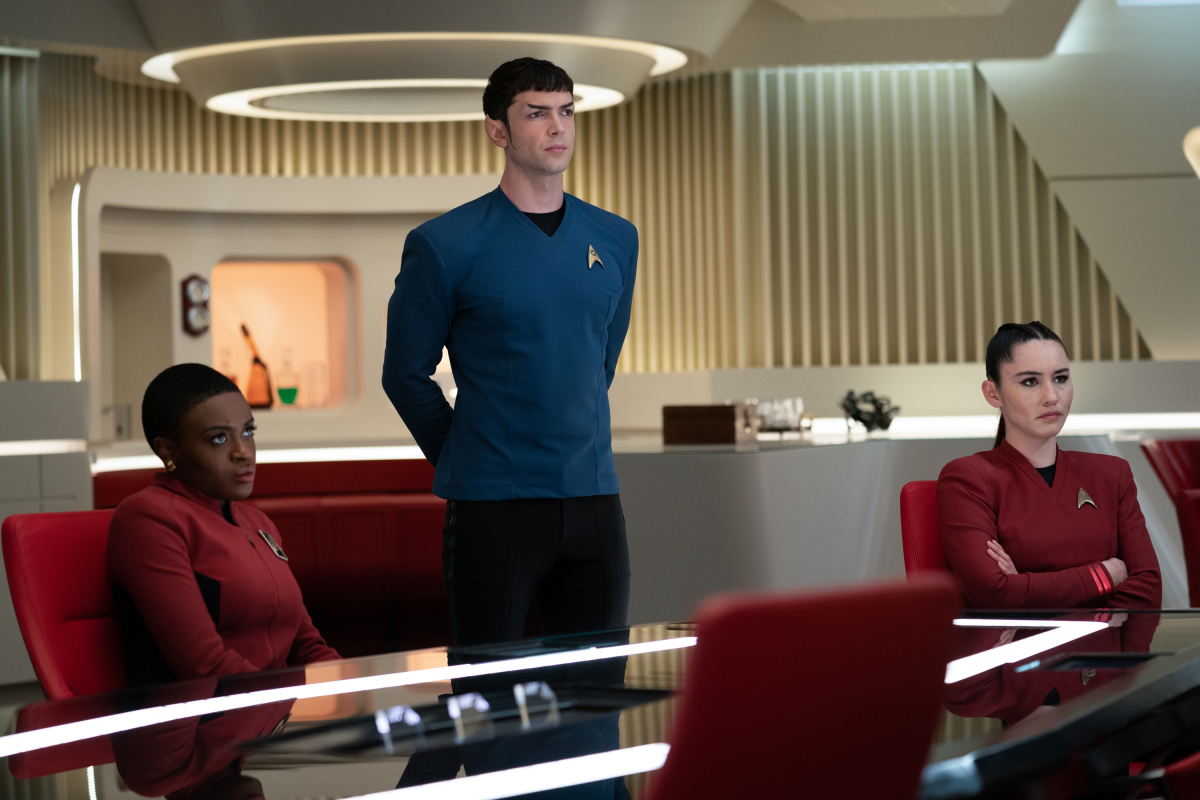 Uhura (Celia Rose Gooding), Spock (Ethan Peck), and La'an Noonien-Singh (Christina Chong) attend a briefing on the path of the comet.