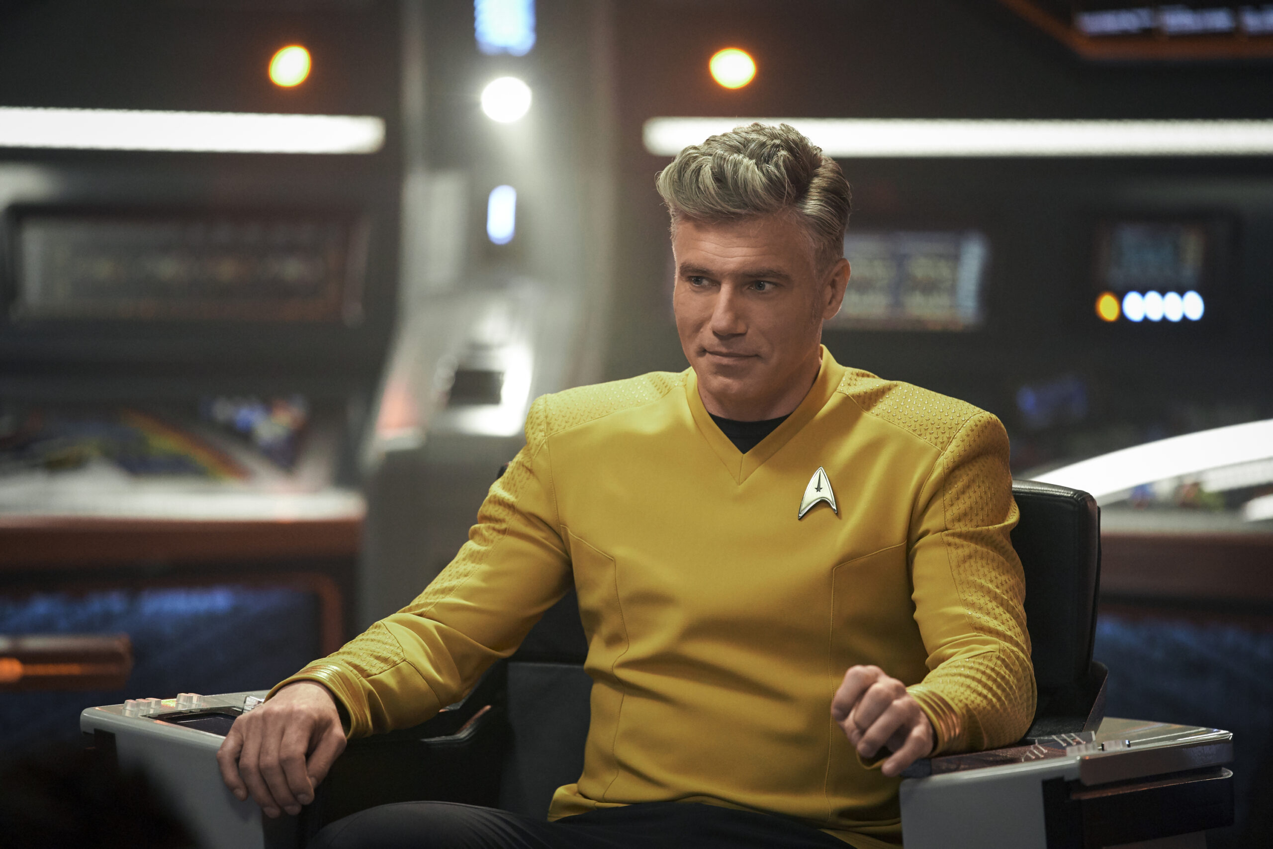 Christopher Pike (Anson Mount) in the captain's chair on board the Enterprise.