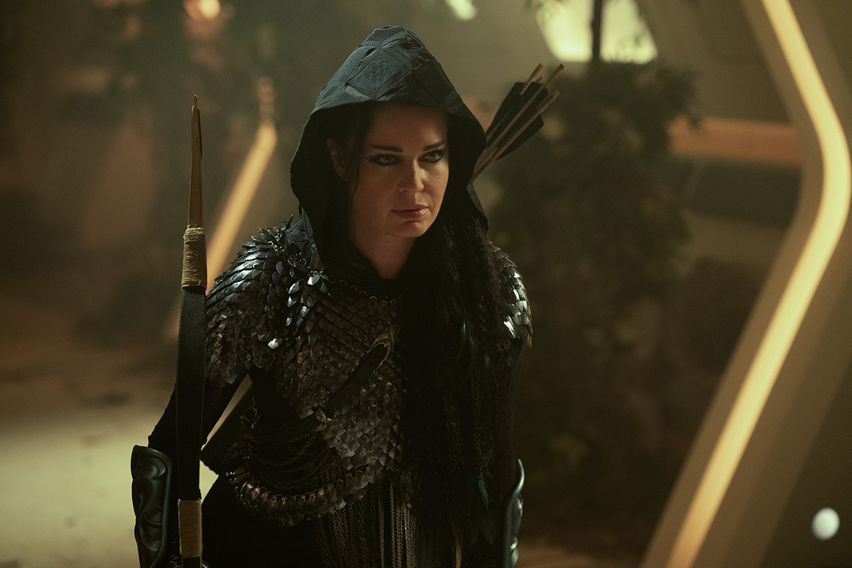 Number One (Rebecca Romijn) as Z'ymira the Huntress.
