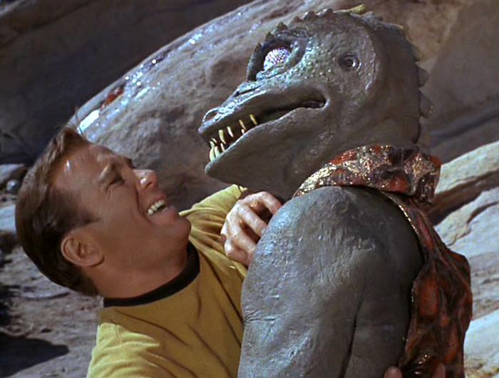 Kirk wrestles the Gorn in "Arena"