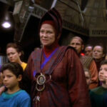 Vedek Winn with the Bajoran schoolchildren on the Promenade in "In the Hands of the Prophets"