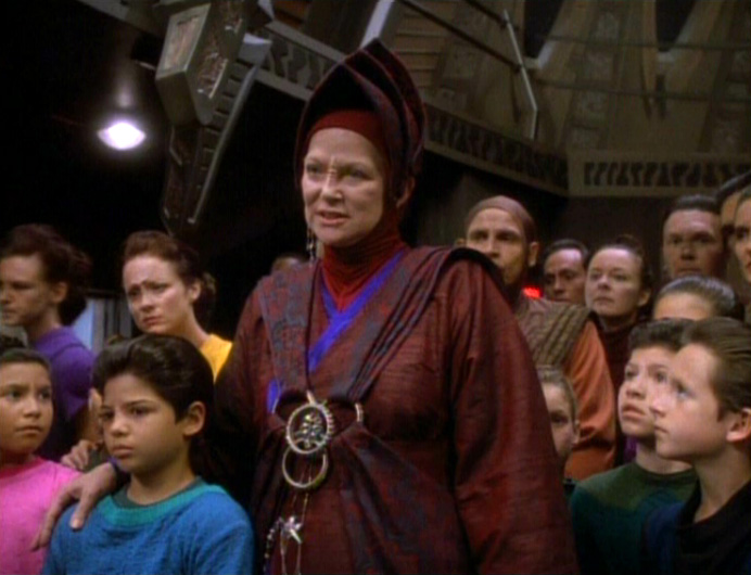 Vedek Winn with the Bajoran schoolchildren on the Promenade in "In the Hands of the Prophets"