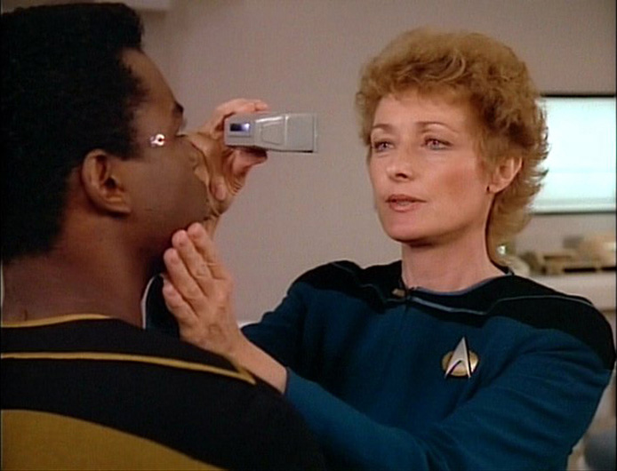 Data performing an ocular procedure on Geordi in "Loud as a whisper"