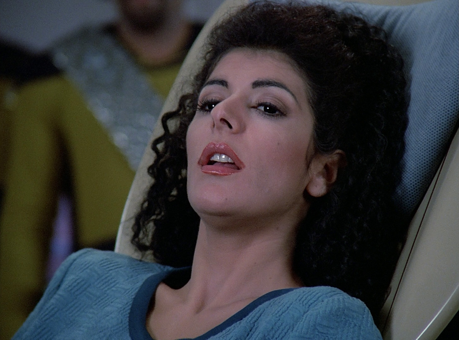 Troi in labour with Worf standing behind her bed