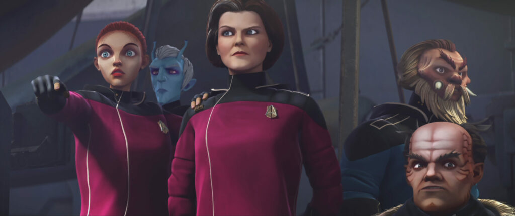 Janeway, Asencia and Frex on the planet, with Ascencia pointing because she sees the Protostar kids