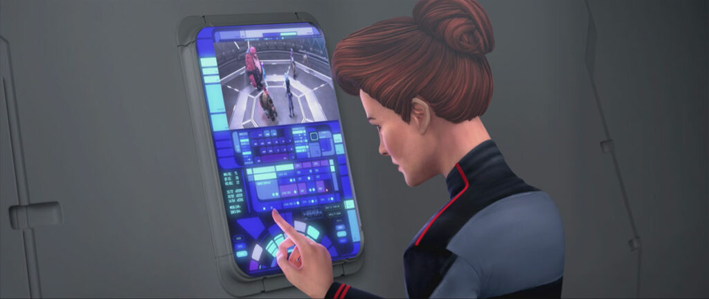 Hologram Janeway presses a button on a panel which also displays a video view of the Protostar crew in the holodeck