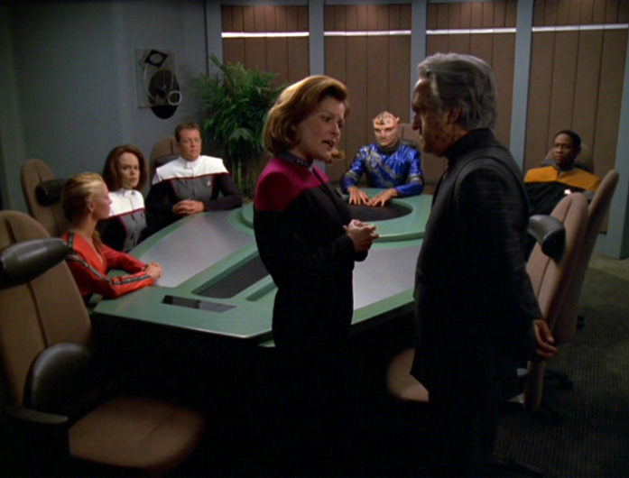 Janeway negotiates with other alien species during the episode "Drive"