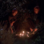 Picard and Crusher around the campfire in "Attached"