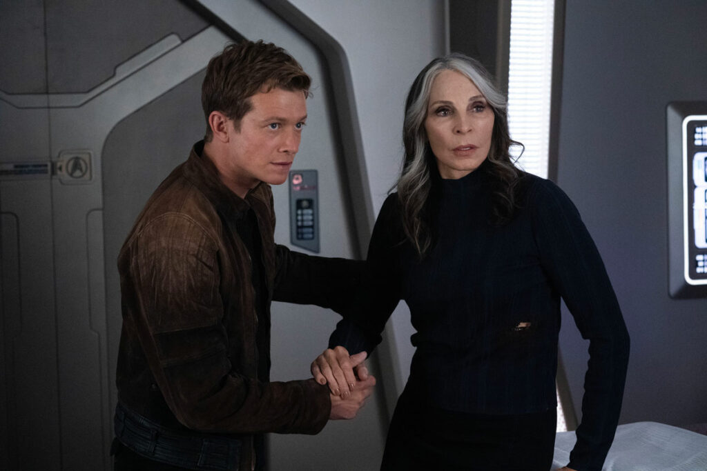 Jack holds Beverly's arm in Sickbay