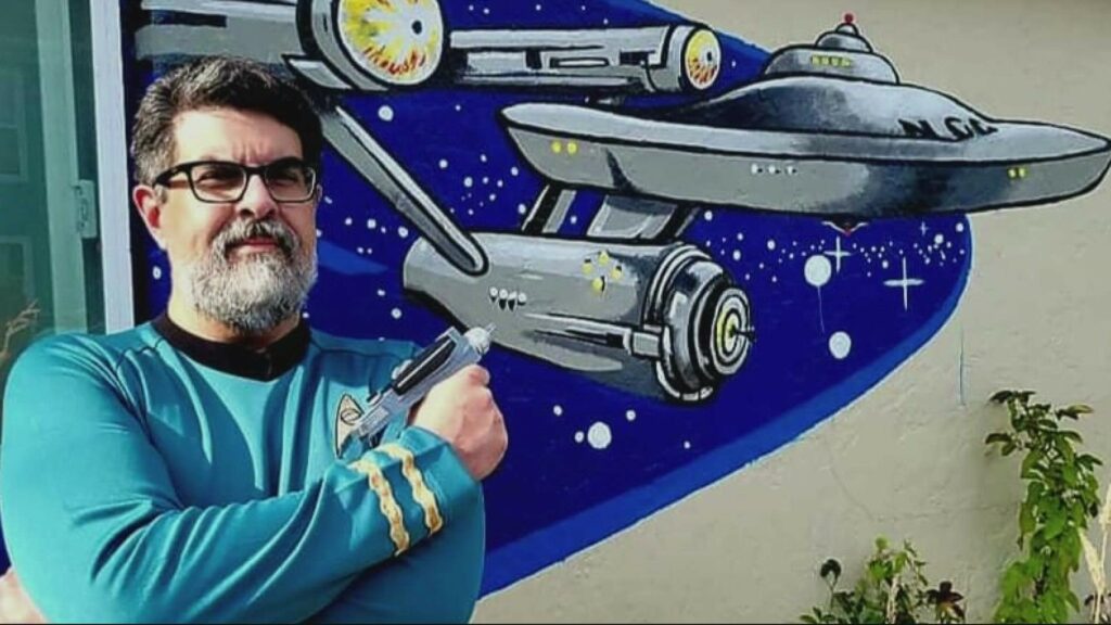 Dr. José-Antonio Orosco poses for KGW8 article on his Star Trek OSU course