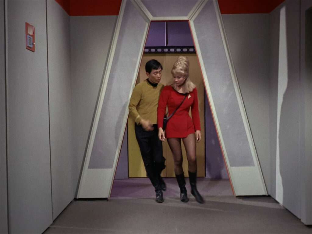 Rand and Sulu in the corridor during "The Man Trap"