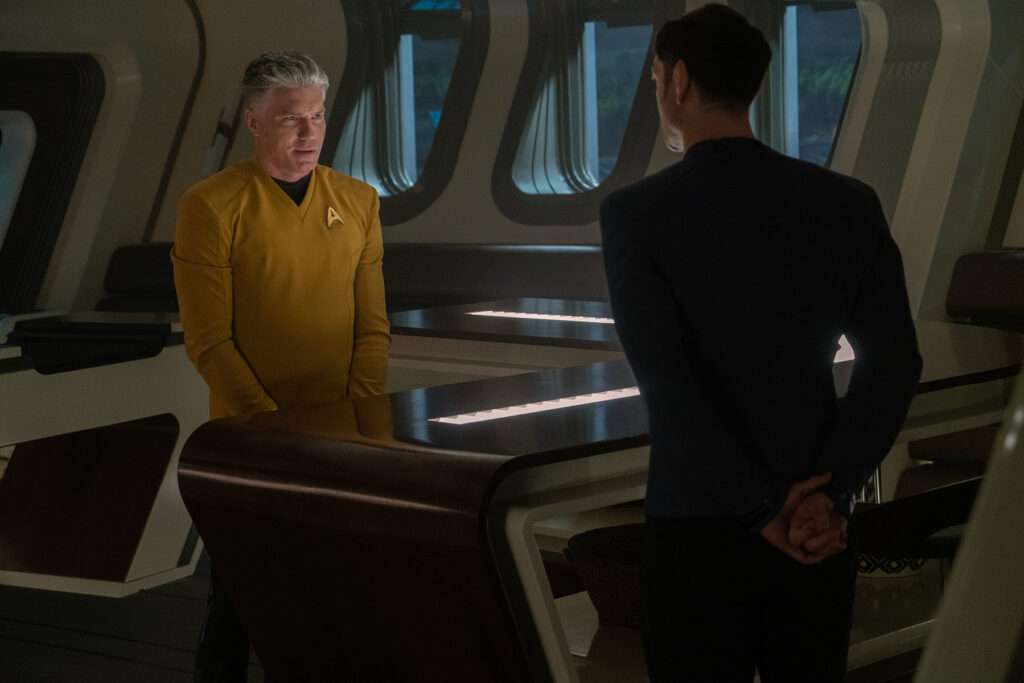 Pike (Anson Mount) leaves the Enterprise under Spock's command.