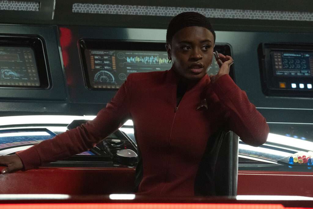 Ensign Uhura (Celia Rose Gooding) at her station.