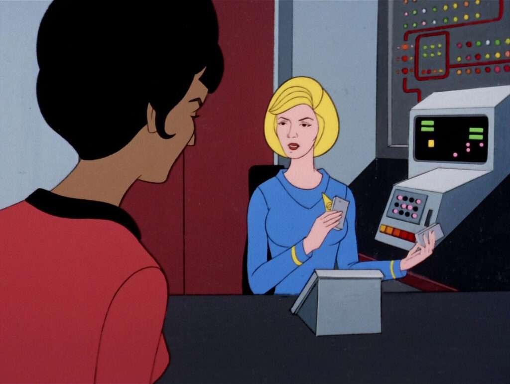 Uhura talks to Chapel as she studies the situation in Sickbay