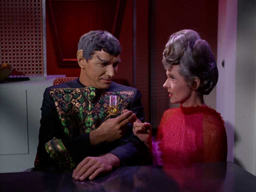 Sarek and Amanda touch fingers in "Journey to Babel"