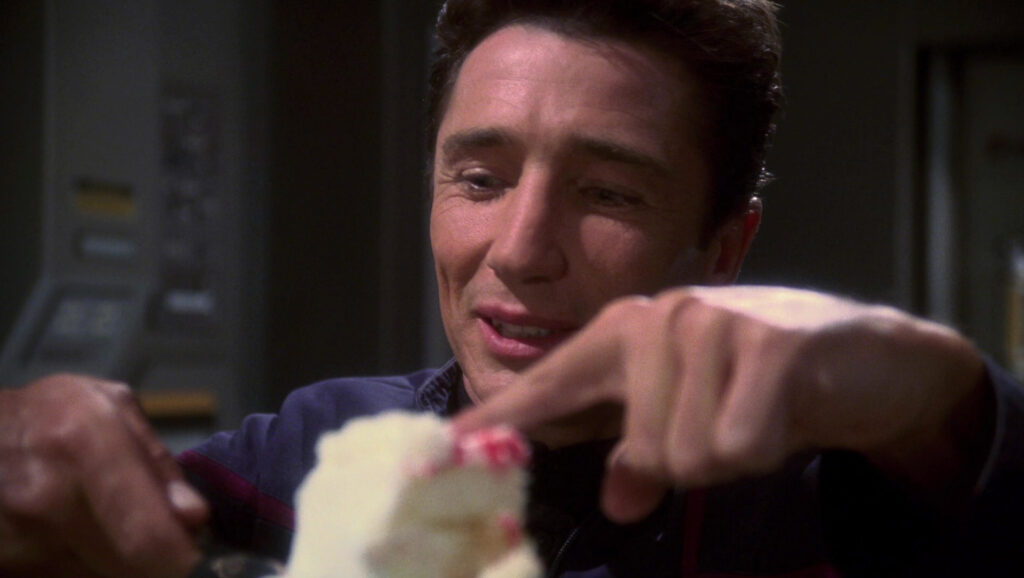 Reed with a piece of birthday cake